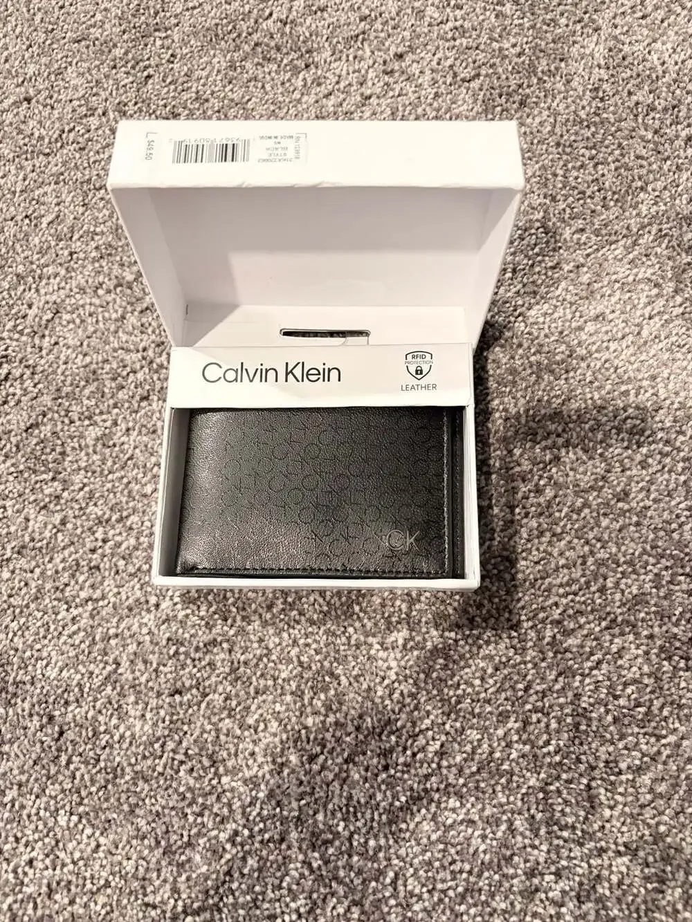Calvin Klein RFID Protected Leather Bifold Wallet with Monogram Print